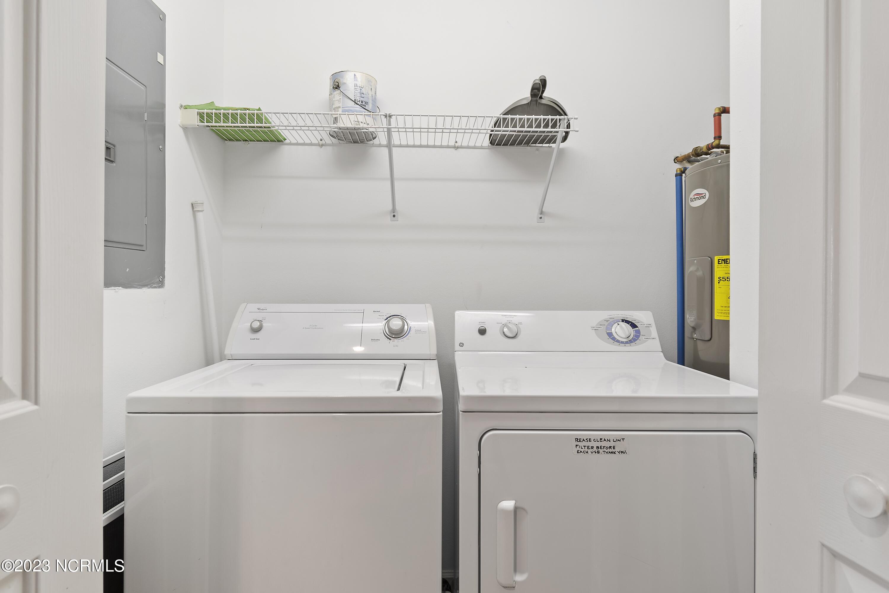 215 Clubhouse Road, Unit 1 Sunset Beach, NC 28468 - Photo 5 of 57 Laundry closet