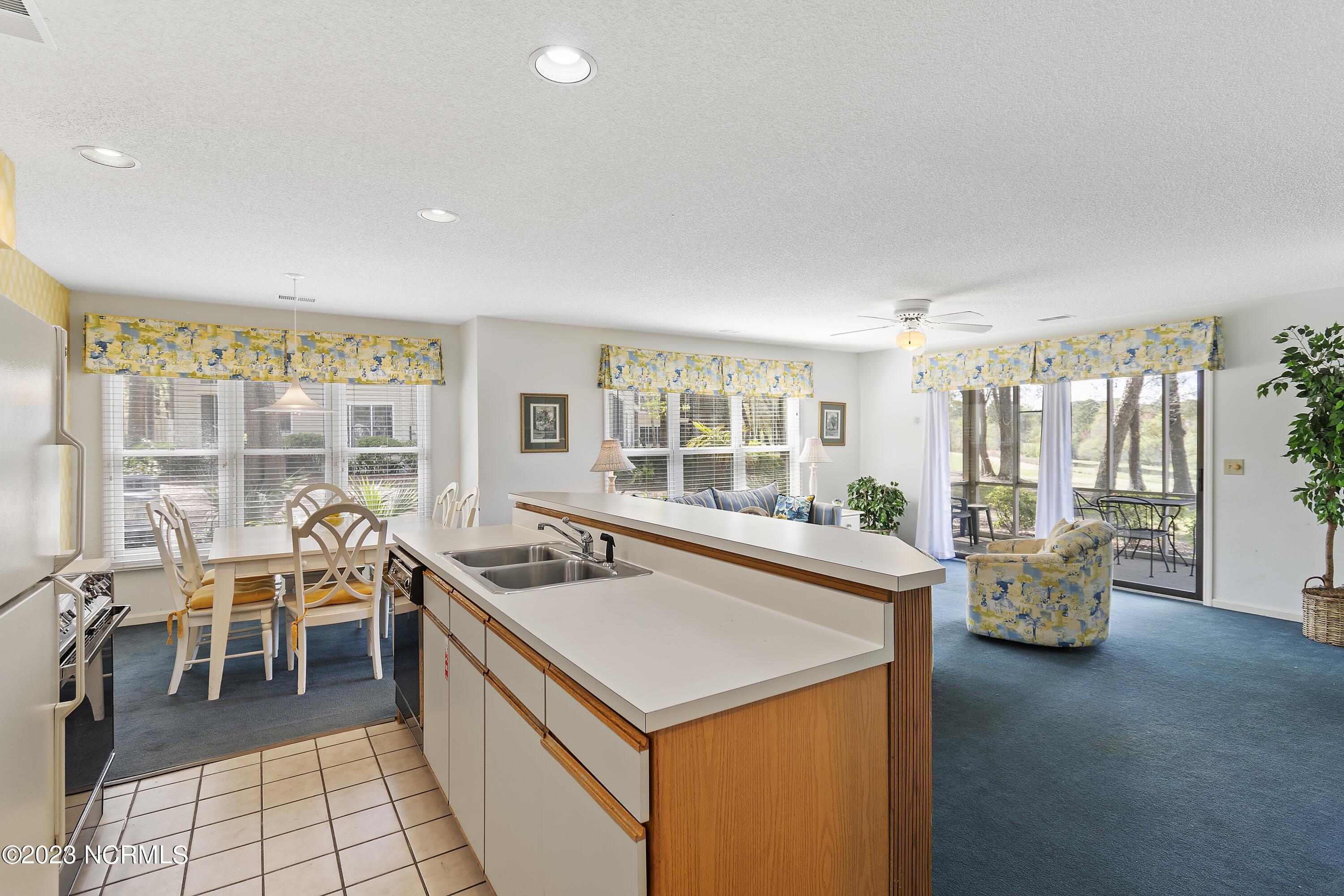 215 Clubhouse Road, Unit 1 Sunset Beach, NC 28468 - Photo 6 of 57 Kitchen to dining