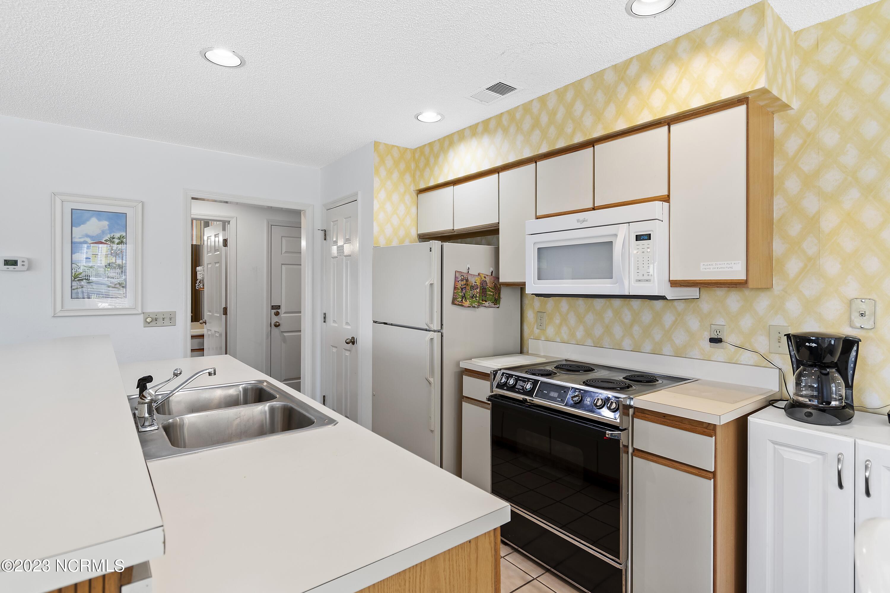 215 Clubhouse Road, Unit 1 Sunset Beach, NC 28468 - Photo 8 of 57 Kitchen