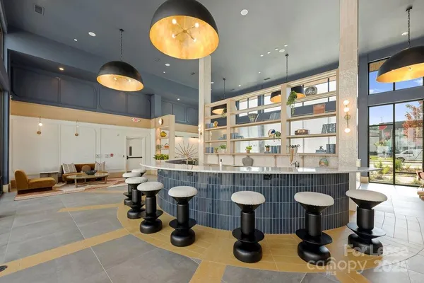 a kitchen with a sink and a stove