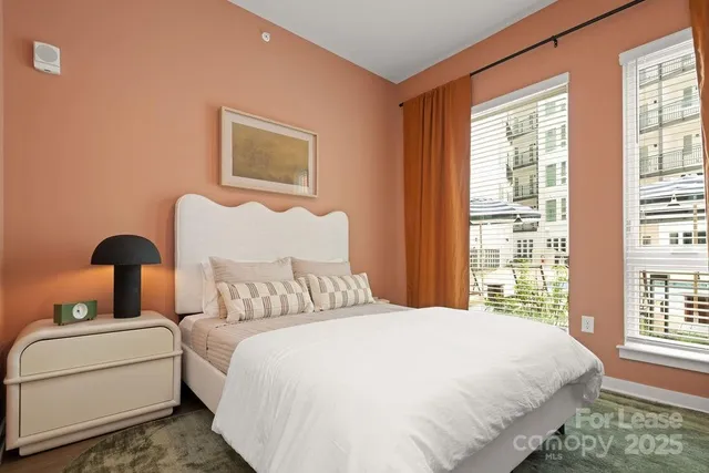 a bathroom with a sink double vanity and a mirror