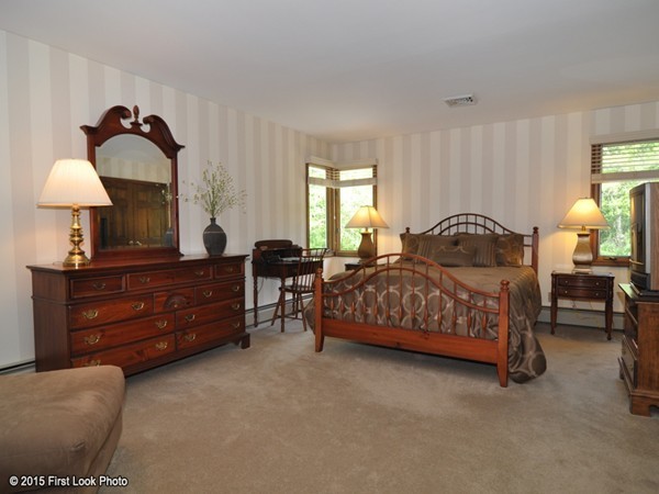 246 Bulgarmarsh Road Tiverton, RI 02878 - Photo 18 of 30 a bedroom with a bed and a lamp on dresser next to a window