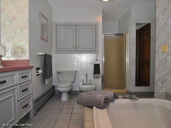 246 Bulgarmarsh Road Tiverton, RI 02878 - Photo 20 of 30 a bathroom with a sink a toilet and a mirror