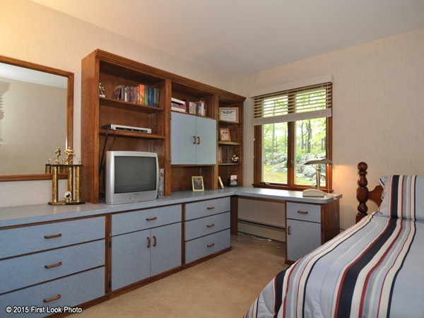 246 Bulgarmarsh Road Tiverton, RI 02878 - Photo 21 of 30 a bedroom with a bed and a large window
