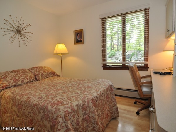 246 Bulgarmarsh Road Tiverton, RI 02878 - Photo 22 of 30 a bedroom with a bed and a window