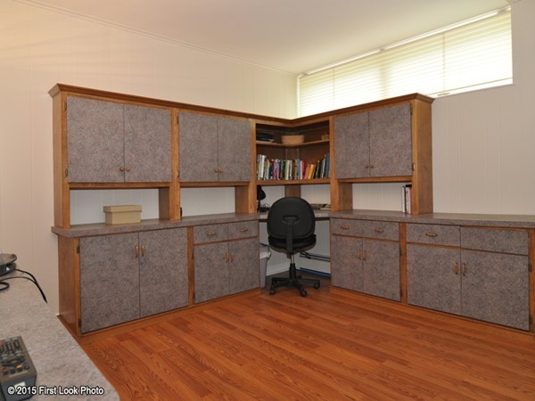 246 Bulgarmarsh Road Tiverton, RI 02878 - Photo 25 of 30 a workspace room with wooden floor and furniture