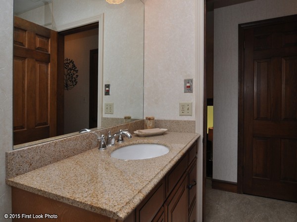 246 Bulgarmarsh Road Tiverton, RI 02878 - Photo 28 of 30 a bathroom with a granite countertop sink and a mirror