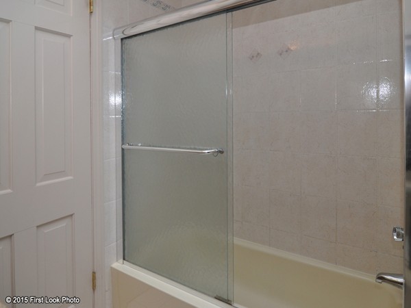 246 Bulgarmarsh Road Tiverton, RI 02878 - Photo 29 of 30 a bathroom with a glass shower door