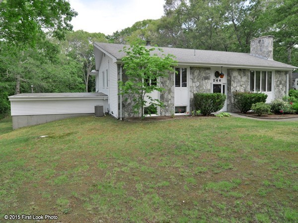 246 Bulgarmarsh Road Tiverton, RI 02878 - Photo 3 of 30 a view of a house with a yard and sitting area