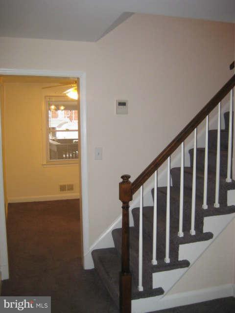 7444 Lawrence Road Baltimore, MD 21222 - Photo 9 of 30 Livingroom to Diningroom