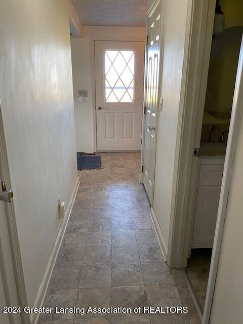 1810 South Dewitt Road St. Johns, MI 48879 - Photo 6 of 64 Sat uploads View to front door