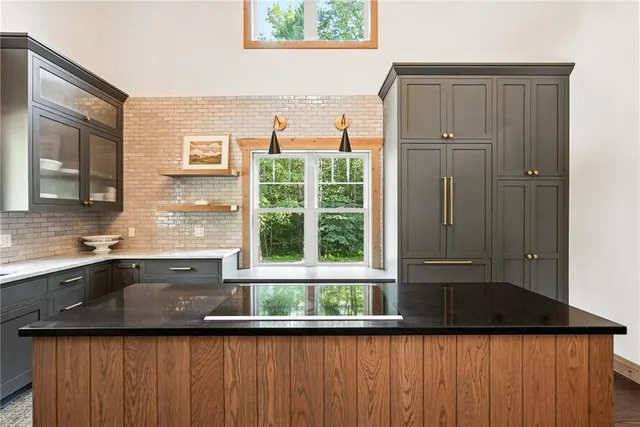 a view of a sink and a window