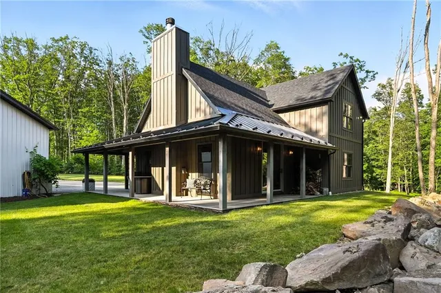 a view of a house with a swimming pool