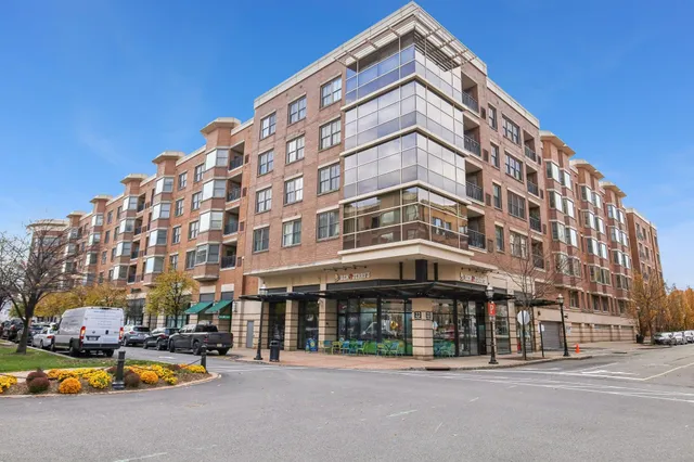 a view of a building with a swimming pool