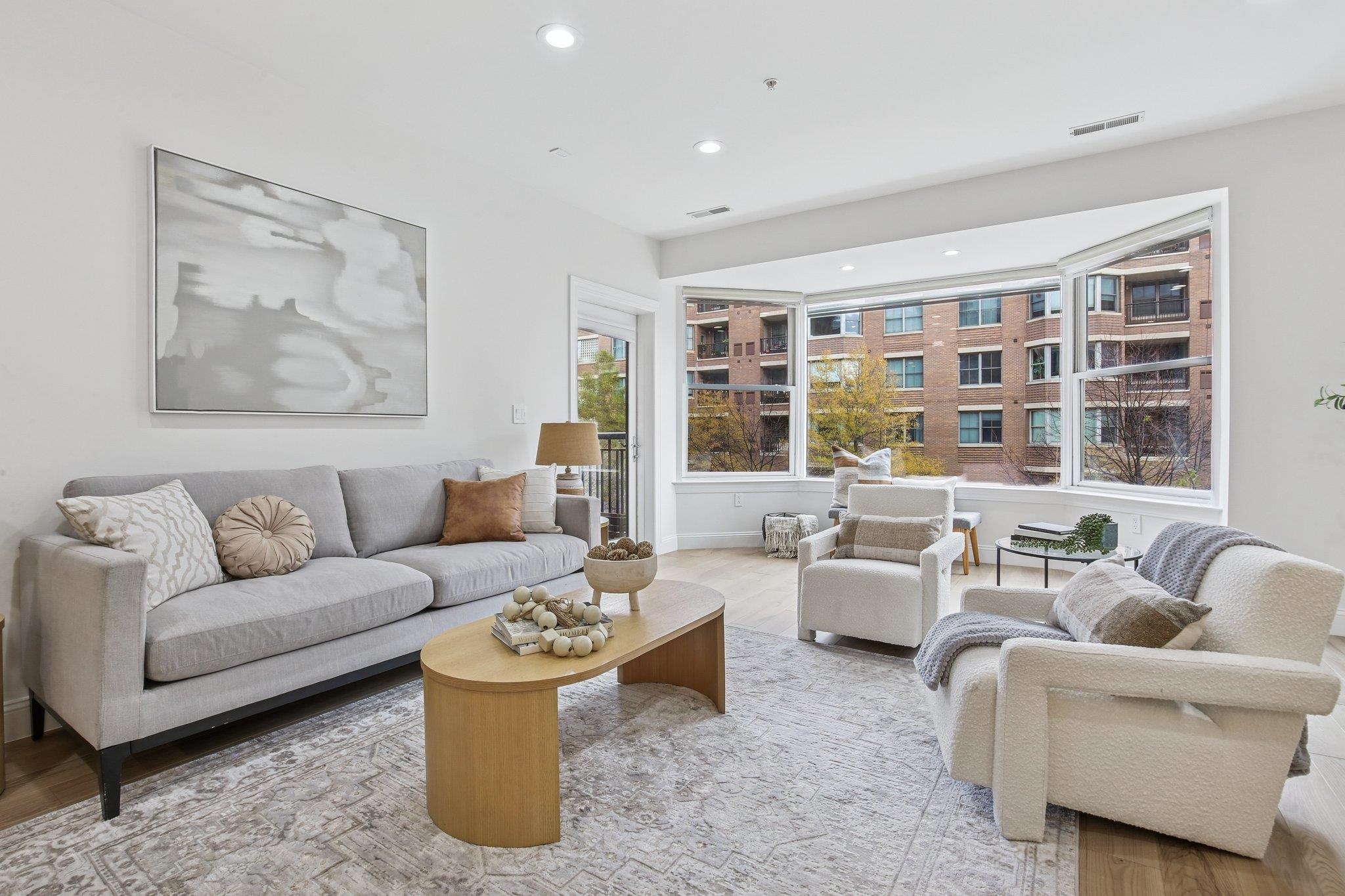 22 Ave At Port Imperial, Unit 208 West New York, NJ 07093 - Photo 15 of 34 a living room with furniture and floor to ceiling window