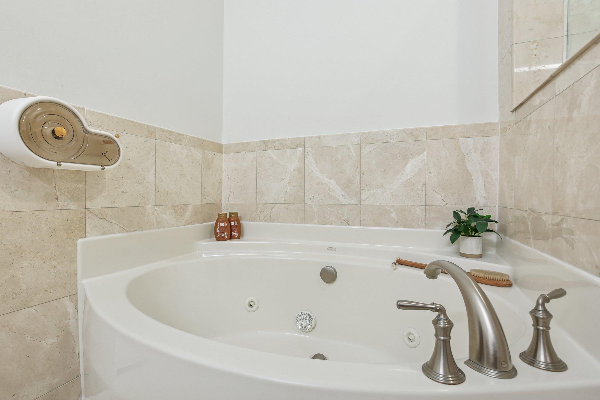 22 Ave At Port Imperial, Unit 208 West New York, NJ 07093 - Photo 27 of 34 a bathroom with a tub