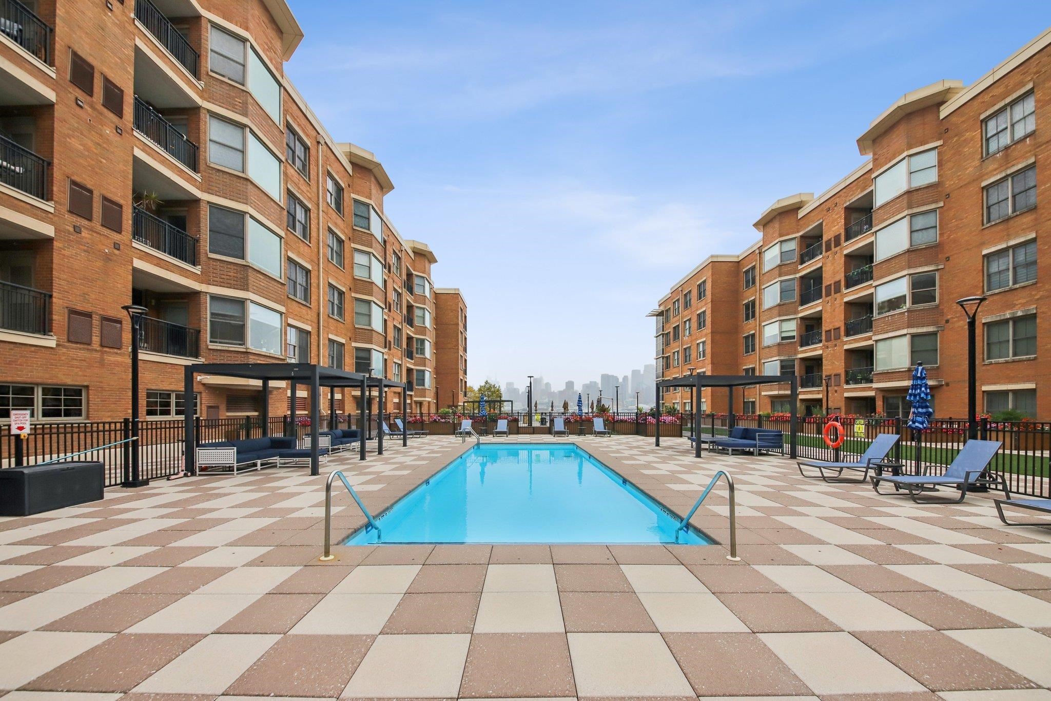 22 Ave At Port Imperial, Unit 208 West New York, NJ 07093 - Photo 29 of 34 a view of a building with sitting area