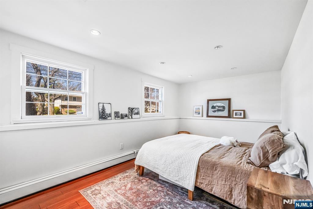 408 Chelsea Street Paramus, NJ 07652 - Photo 36 of 49 a bedroom with a bed and a window