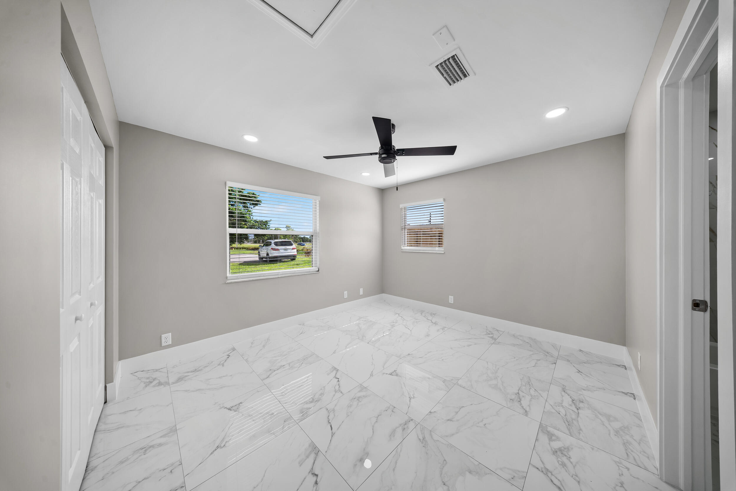 1627 Southeast Monroe Street Stuart, FL 34997 - Photo 14 of 33 a view of an empty room with a window