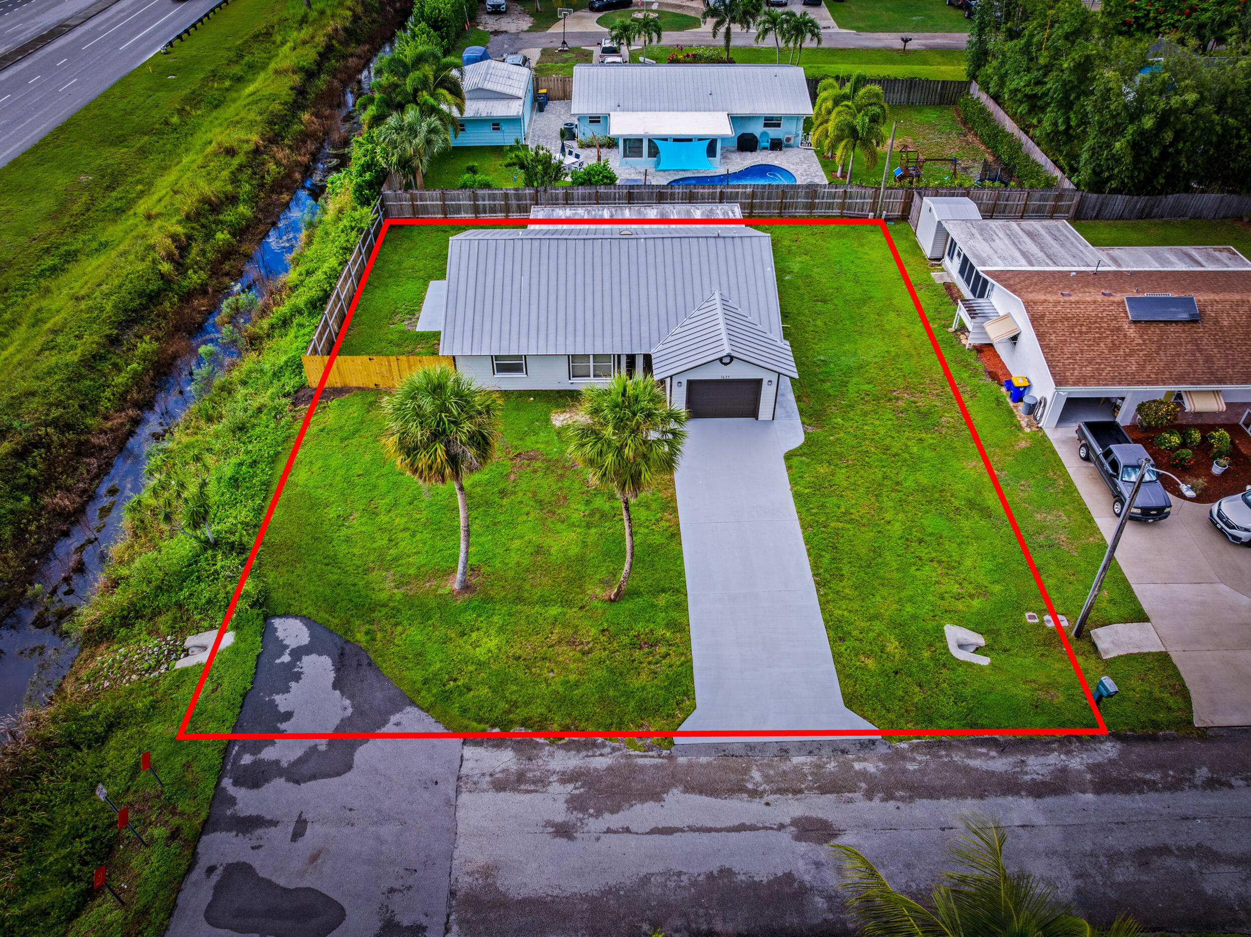 1627 Southeast Monroe Street Stuart, FL 34997 - Photo 28 of 33 an aerial view of a house