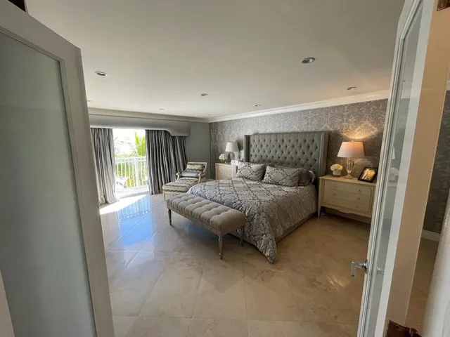 a view of a hallway with a white walls