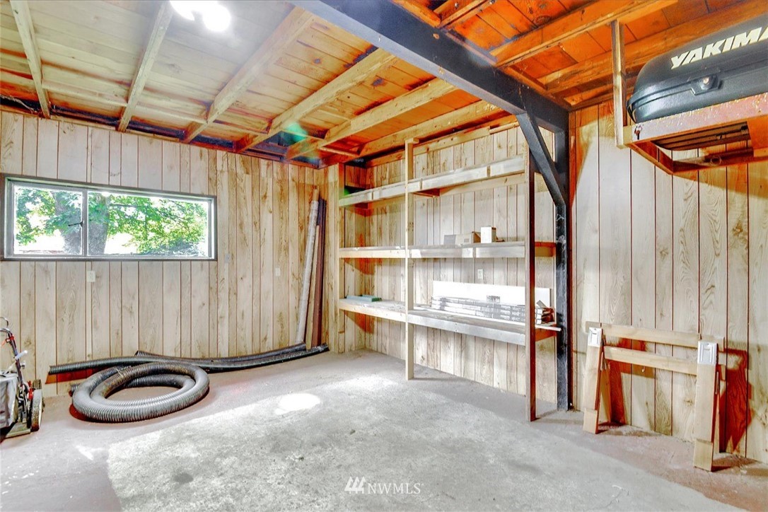 5202 Northeast 3rd Street Renton, WA 98059 - Photo 21 of 27 a view of a room with wooden floor and furniture