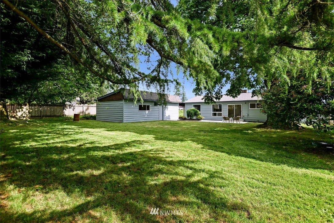 5202 Northeast 3rd Street Renton, WA 98059 - Photo 22 of 27 a front view of house with yard and green space