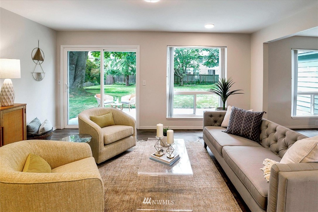 5202 Northeast 3rd Street Renton, WA 98059 - Photo 4 of 27 a living room with furniture and a large window