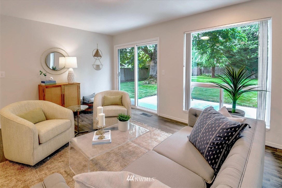 5202 Northeast 3rd Street Renton, WA 98059 - Photo 6 of 27 a living room with furniture and a large window