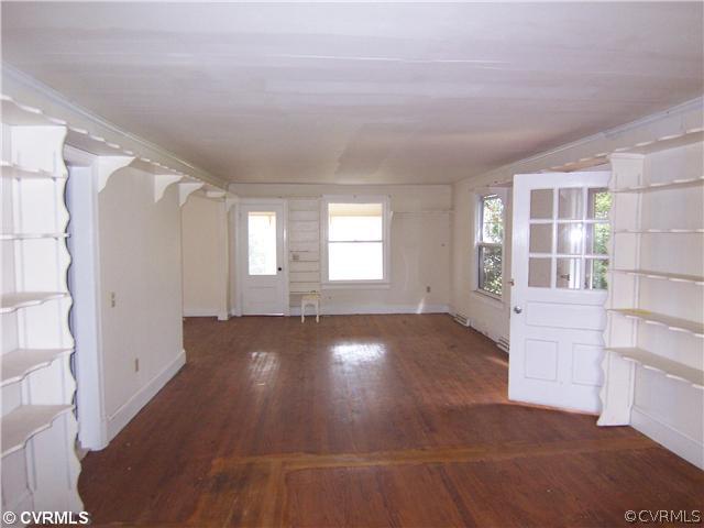 498 Cow Shed Road Lancaster, VA 22503 - Photo 8 of 12 Living Room - Living with plenty of built in books