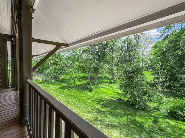 a bathroom with double vanity sinks a vanity a mirror and a shower