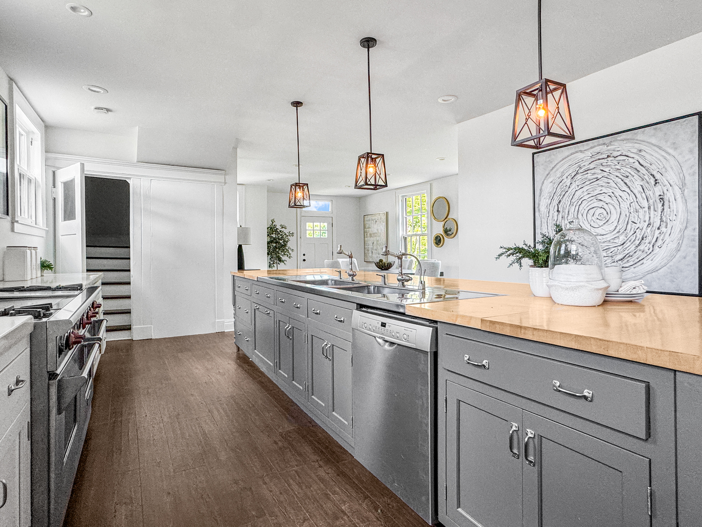 141 Loretto Court Wheaton, IL 60189 - Photo 21 of 46 a kitchen with kitchen island granite countertop a stove a sink and a wooden floors