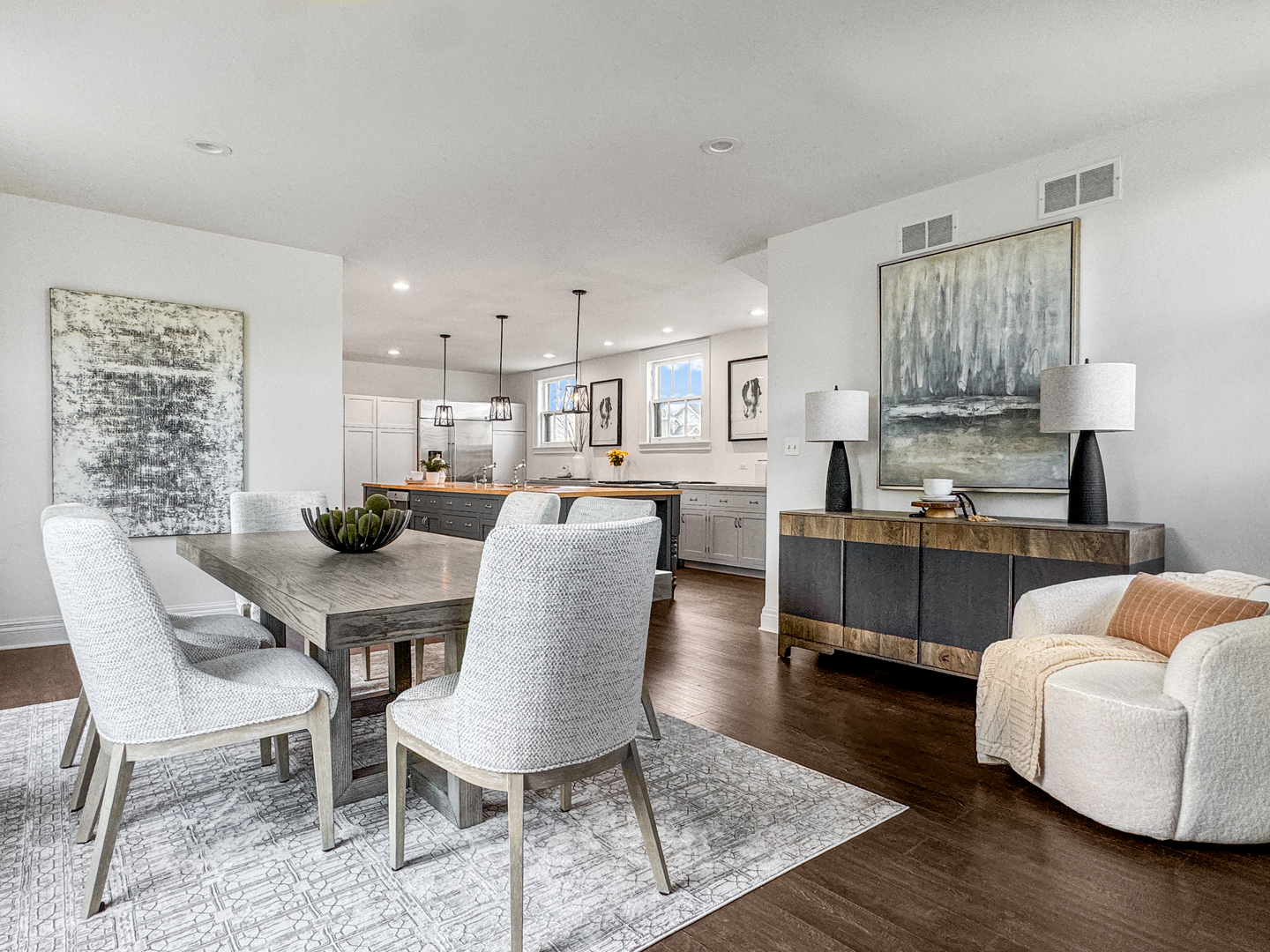 141 Loretto Court Wheaton, IL 60189 - Photo 24 of 46 a kitchen with a table chairs refrigerator and couch