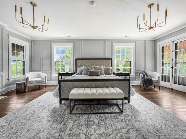 a bathroom with a tub sink and toilet