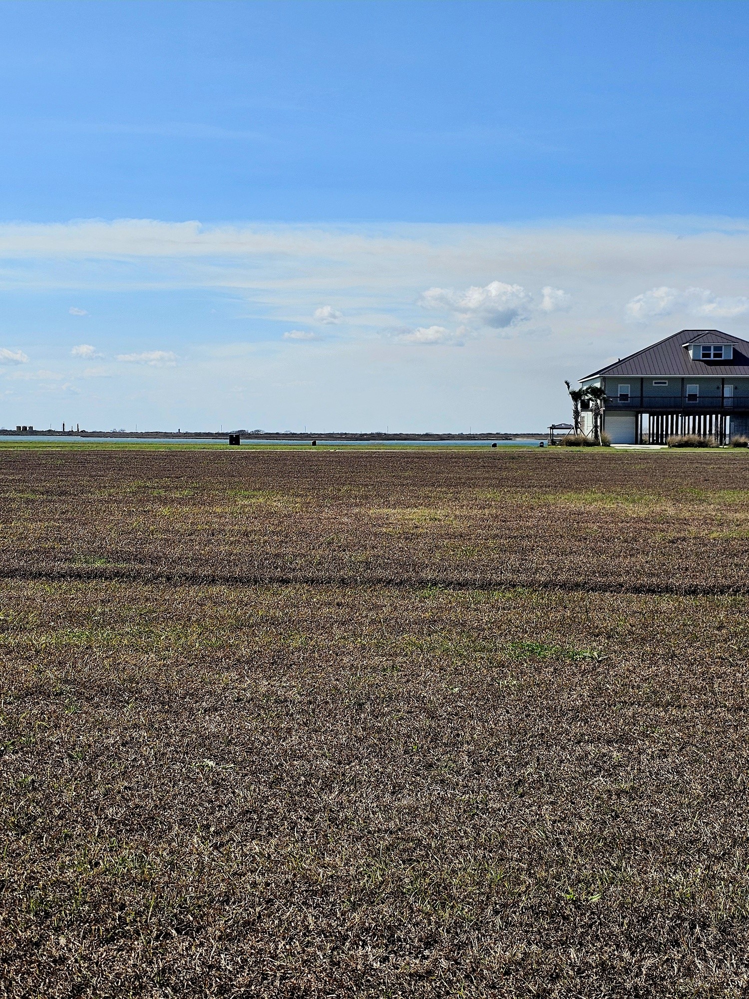 3036 Sandy Lane Palacios, TX 77465 - Photo 31 of 32 a view of an ocean and beach