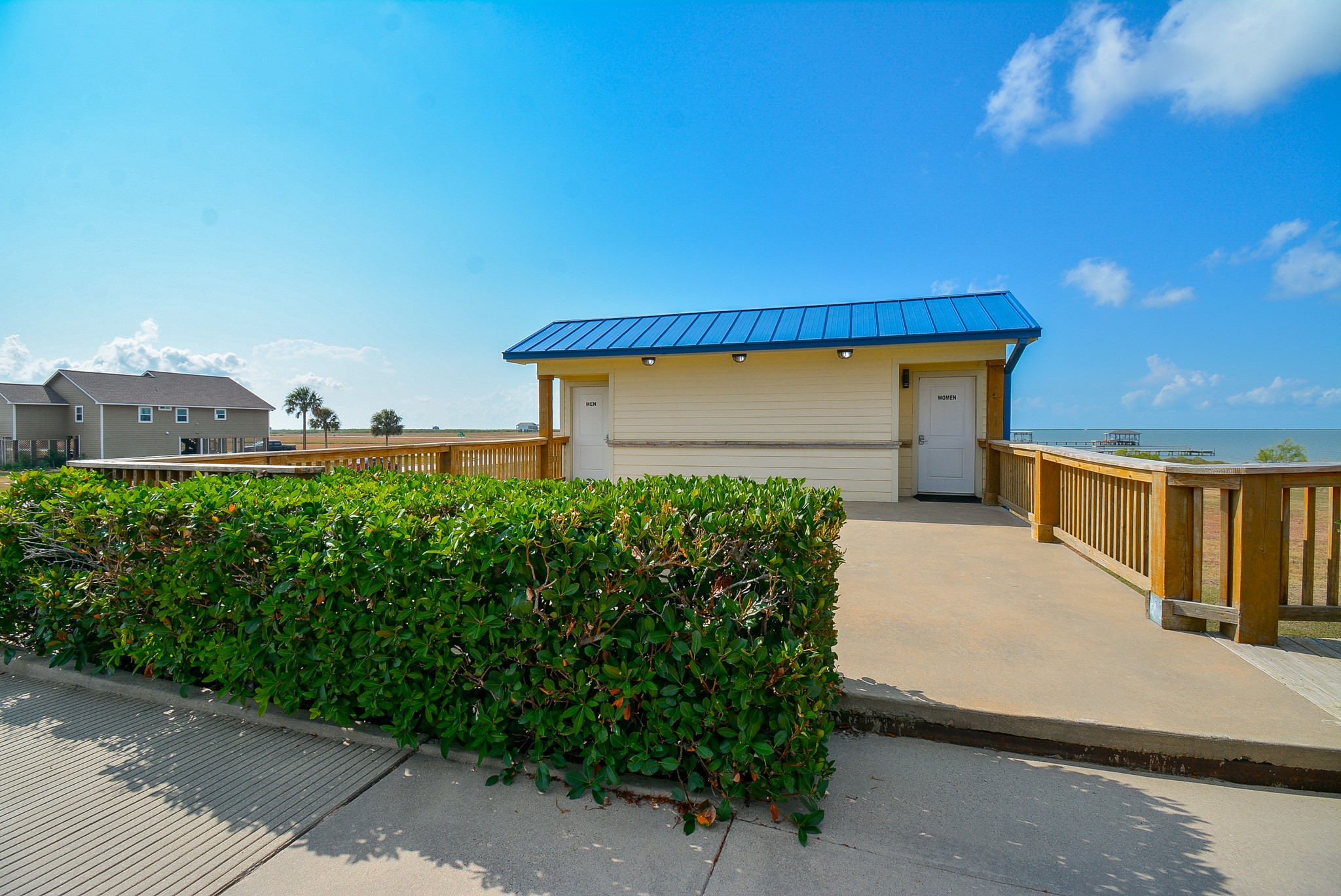 3036 Sandy Lane Palacios, TX 77465 - Photo 6 of 32 a front view of a house with garden