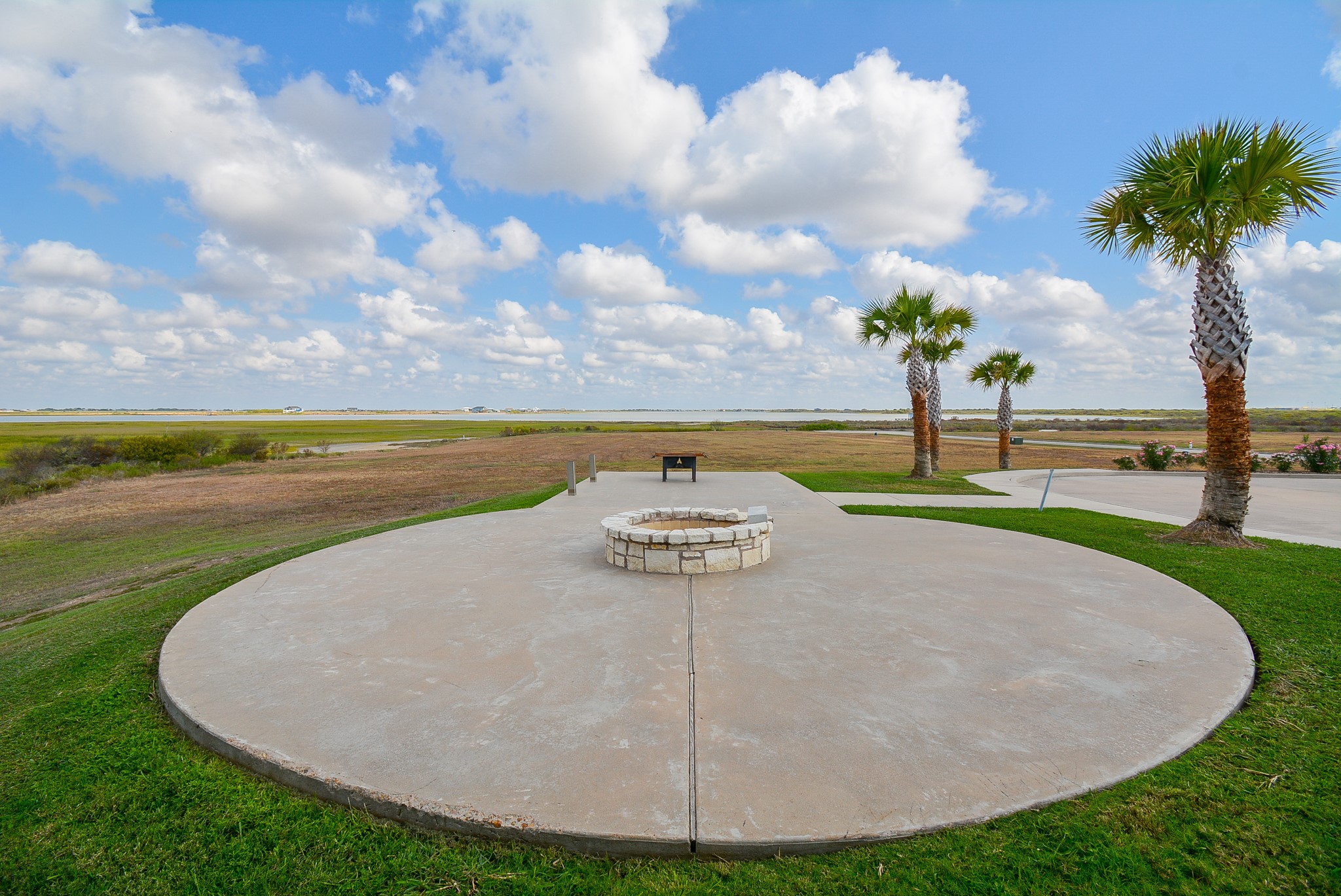3036 Sandy Lane Palacios, TX 77465 - Photo 10 of 32 a view of a swimming pool with a yard