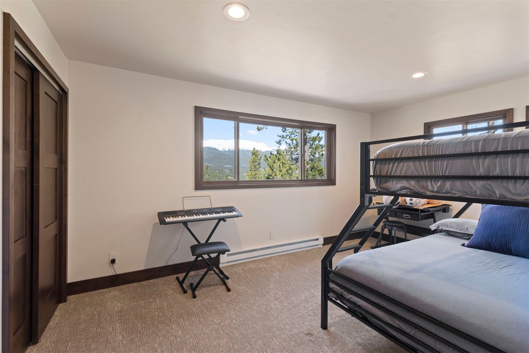 103 Bearing Tree Road Breckenridge, CO 80424 - Photo 19 of 30 a bedroom with bed and a window