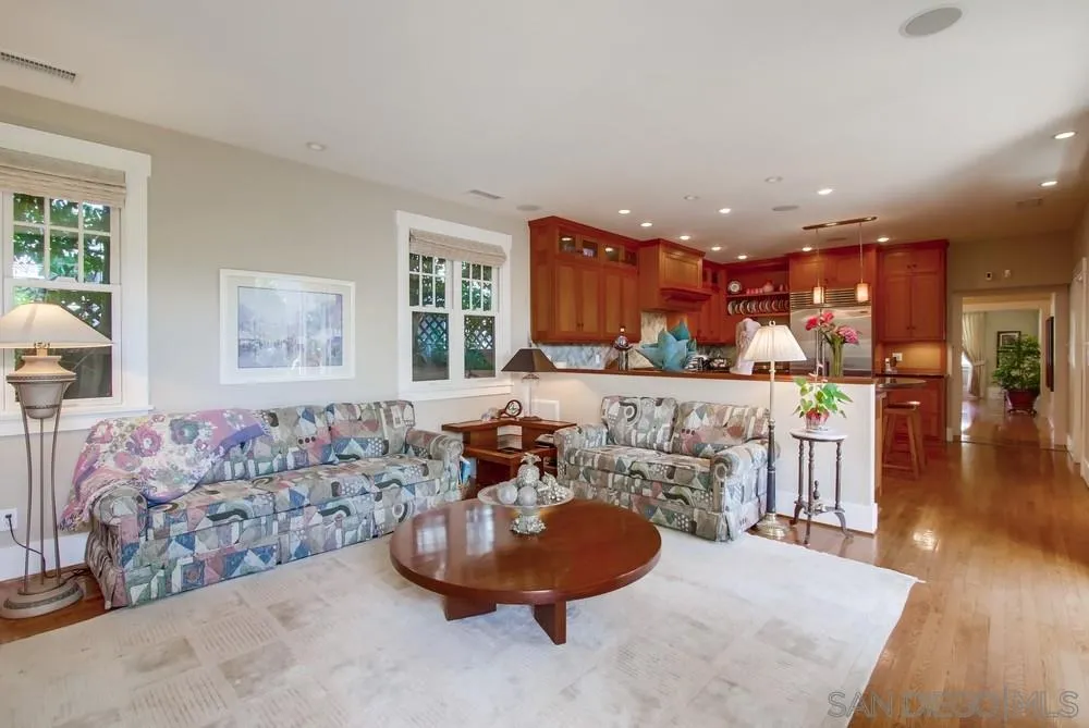 738 B Avenue Coronado, CA 92118 - Photo 14 of 25 a living room with furniture and a wooden floor