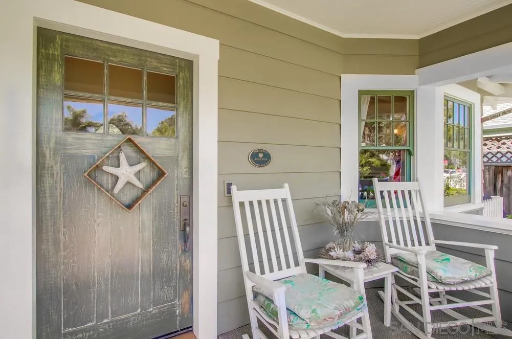 738 B Avenue Coronado, CA 92118 - Photo 2 of 25 a view of a hallway with furniture and wooden floor