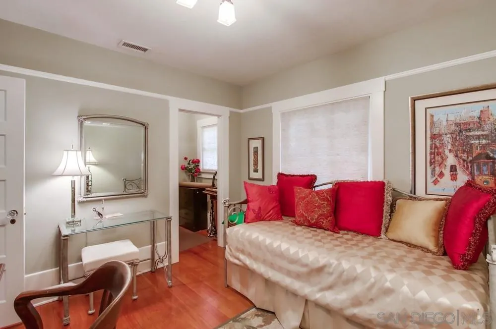 738 B Avenue Coronado, CA 92118 - Photo 9 of 25 a living room with furniture and a lamp
