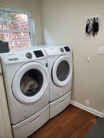 a utility room with dryer and washer
