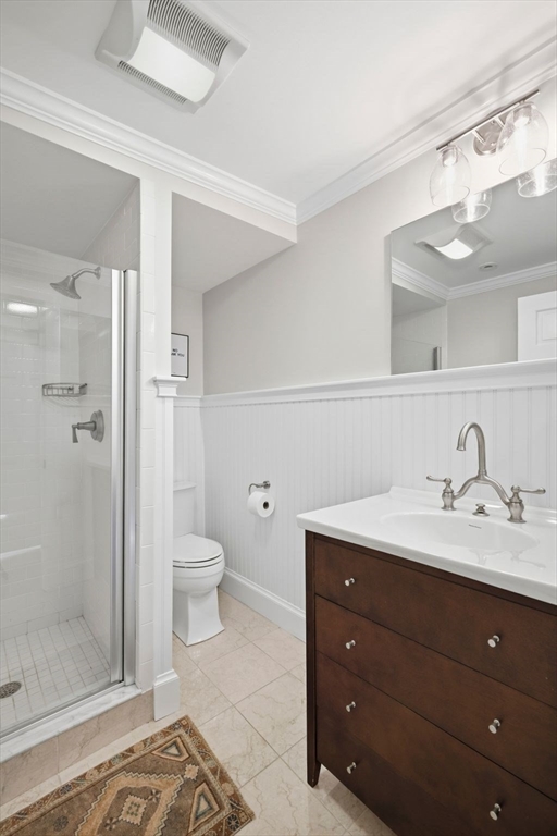 33 Franklin Street Marblehead, MA 01945 - Photo 25 of 42 a bathroom with a toilet a sink and a shower