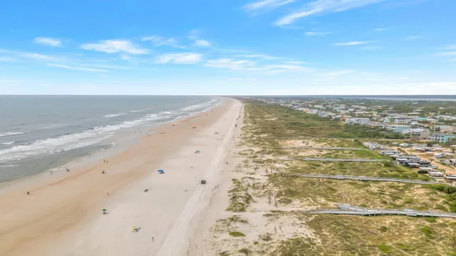a view of a house with swimming pool and porch