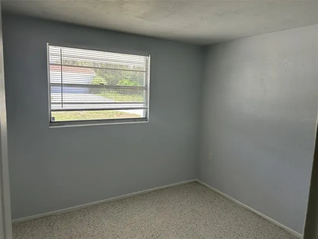 an empty room with a window