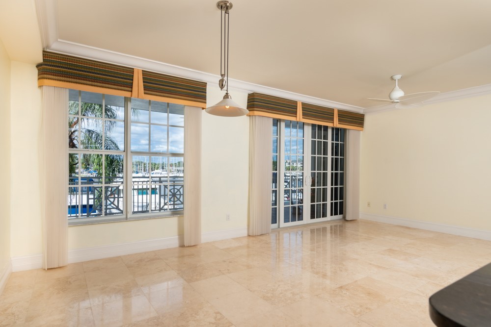 2240 Front Street, Unit 103 Melbourne, FL 32901 - Photo 8 of 31 a view of an empty room with a window