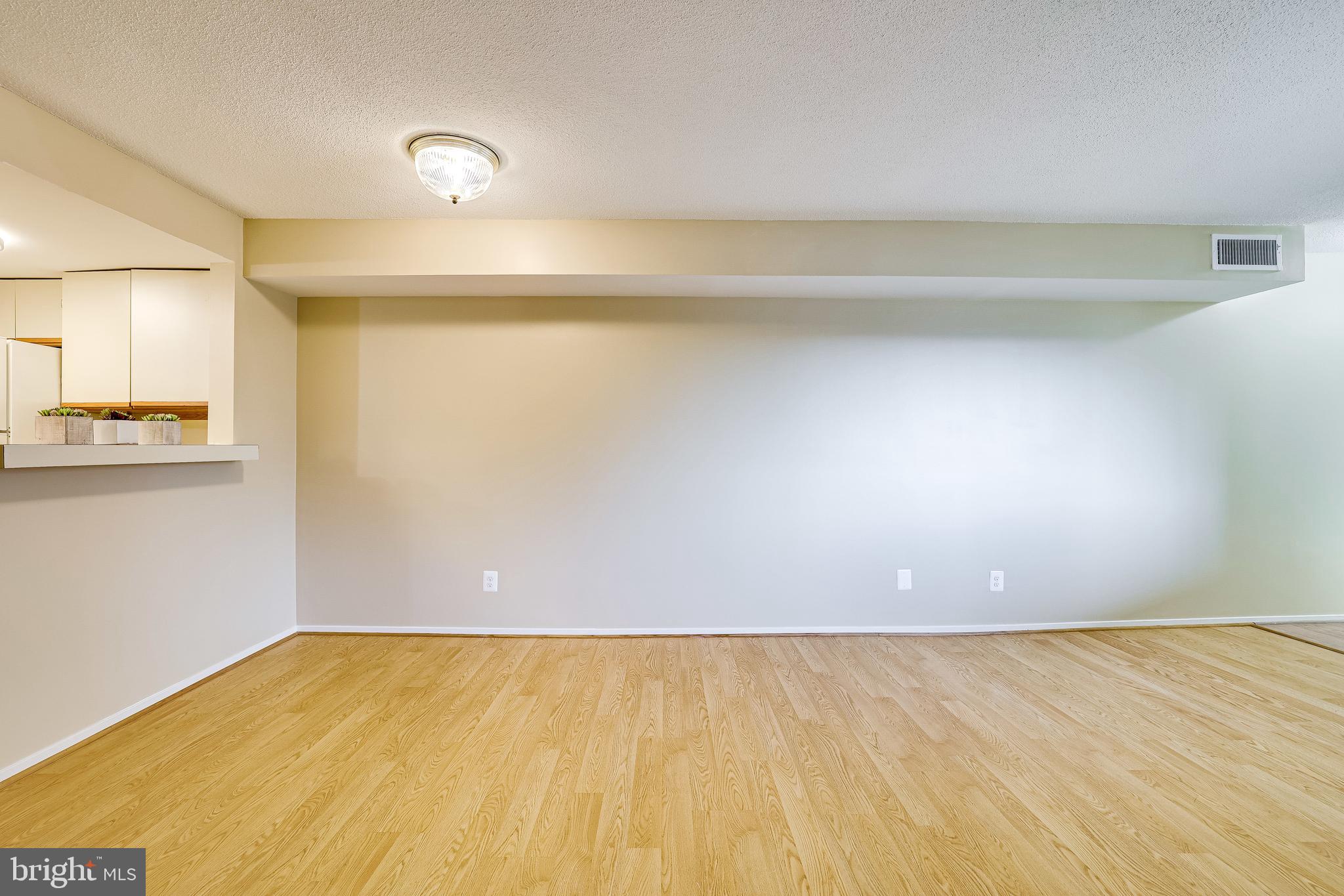 1951 Sagewood Lane, Unit 517 Reston, VA 20191 - Photo 16 of 50 Low-maintenance laminate floors.