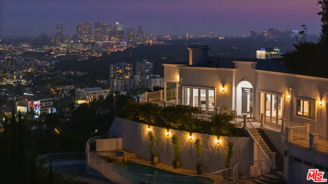 a view of a balcony with city view
