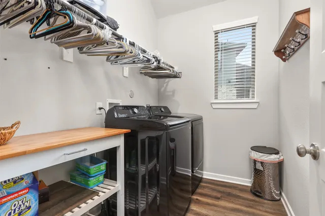 a spacious bedroom with a bed and a window