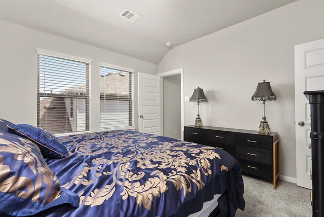a view of room and hallway with closet